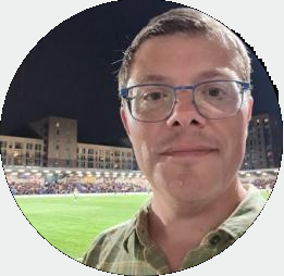 headshot of matthew gebhardt with gray background